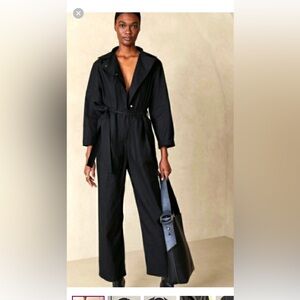 Jumpsuit ..Runs big!!Banana Republic new black Poplin jumpsuit.size 0 petite.